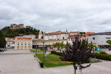 Leiria, Portugal, August 29, 2021: The Paulo VI Square, the Our Lady of the Immaculate Conception Cathedral and Leiria Castle..