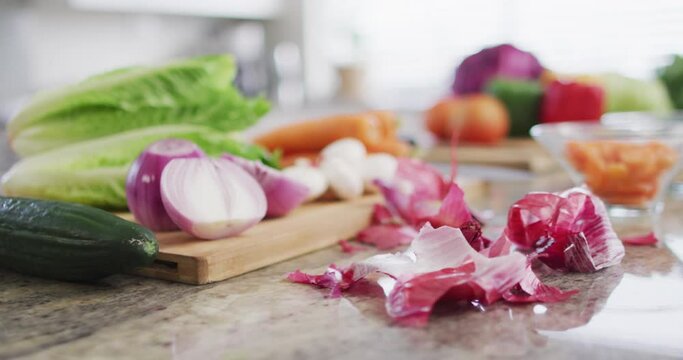 Video of vegetables lying on cutting board prepared for cooking