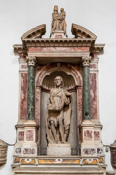 Jesus Christ statue decorating marble altar carved in the wall inside catholic church in Napoli