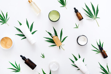 Composition of natural ingredients for personal care with hemp extract. Flat lay. Scrub, mask, serum and cream based on cannabis oil