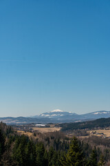 Amazing aerial panoramic view on the mountains, forest, village from observation deck in Poland, Rabka-Zdroj