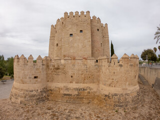 Cordoba, Spain, September 13, 2021: The defensive tower from the Muslim era: the Calahorra Tower, Guadalquivir River, and the Roman Bridge.