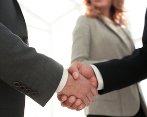 Close up business man handshake together on meeting room