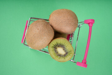 kiwi fruit on green background