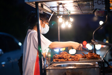 Thai street food fried chicken on a sleepless night