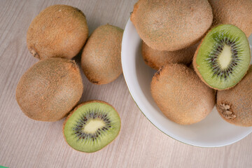 kiwi fruit on wooden background