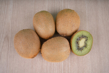kiwi fruit on wooden background