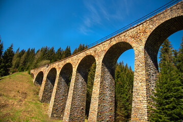 Fototapeta na wymiar Telgart viadukt. Railway stone bridge in the nature. Slovakia, Europe. 