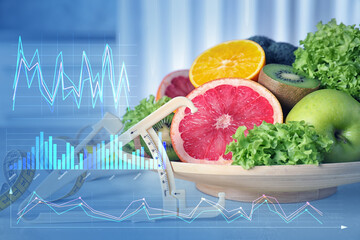 Body fat caliper, fresh ripe vegetables, fruits on table and illustration of charts. Nutritionist's recommendations