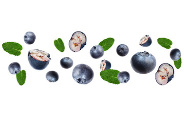 Tasty ripe blueberries with green leaves flying on white background