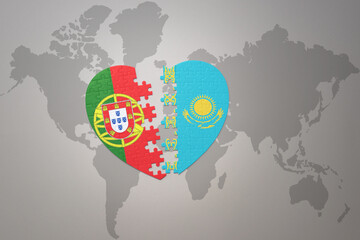 puzzle heart with the national flag of portugal and kazakhstan on a world map background.Concept.