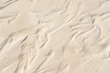 Abstract white sand sediment pattern, seaside natural organic landscape shining in the sun. Top...