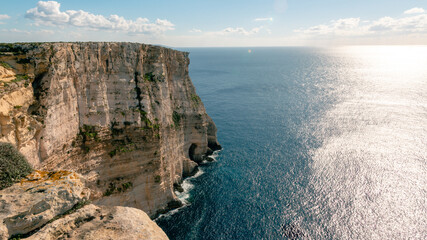 Fototapeta na wymiar Ta' Ċenċ Cliffs, Gozo, Malta. Mid day, few clouds, sunny. Photo taken in January 2022.