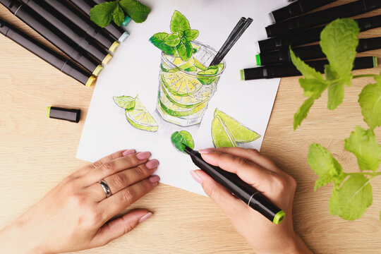 hand with illustration mojito cocktail isolated on white