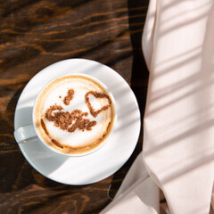 Isolated cappuccino with decorated topping 