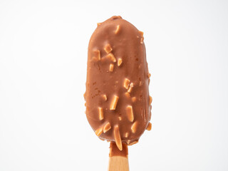 Chocolate Ice Cream with almonds on a stick.