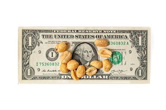 'Inflation Concept With Peanuts  On Top Of A U.S. One Dollar Bill'