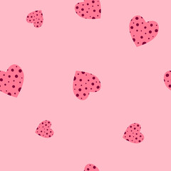Pattern with hearts and dots on pink background. 
