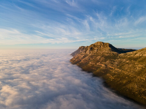 Aerial view of False Bay low cloud sunrise, Simonstown, Western Cape Province, South Africa.