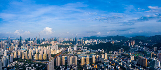 an aerial panorama of summer sunrise cityscape in downtown shenzhen, china
