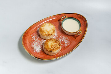 isolated cheesecake on a red plate for your menu, free space for text