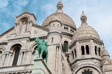 Fototapeta na wymiar View from below of a part of the Sacré-Coeur Basilica in Paris, France.