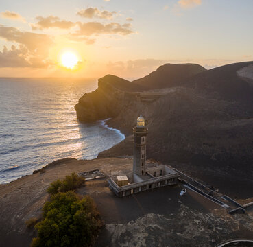 Aerial View of Farol da Ponta dos Capelinhos at sunset, Faial island, Capelo, Azores, Portugal.