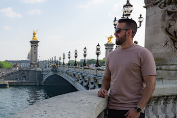 Tourist boy on the Alexander III bridge in Paris