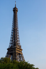 Part of the Eiffel Tower in Paris with the blue sky