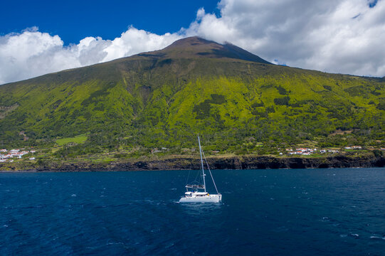 Aerial View of Sailboat while sailing in a regatta off the coast of Matriz, Azores, Portugal.