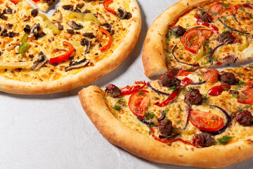 Tree types of italian pizza banner with free space for text, sliced pizza close up