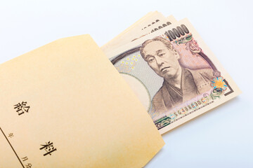 給料イメージ（お金の入った給料袋）