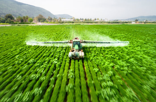 Aerial View of sprinkler at work among the cultivated fields, Beit Alfa, Northern District, Israel.
