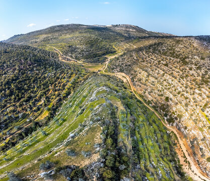 Aerial View of natural formation in the hills with paths, Ramallah and al-Bireh Governorate, Palestine.