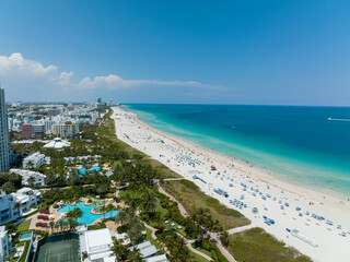 wide shot of miami beach during the bright summer day from aerial view