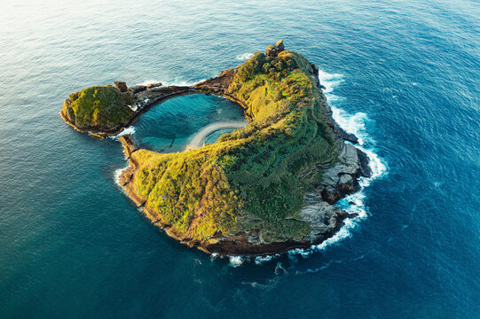 Aerial view of the small, volcanic island Vila Franco do Compa at sunrise, Sao Miguel, Azores, Portugal.