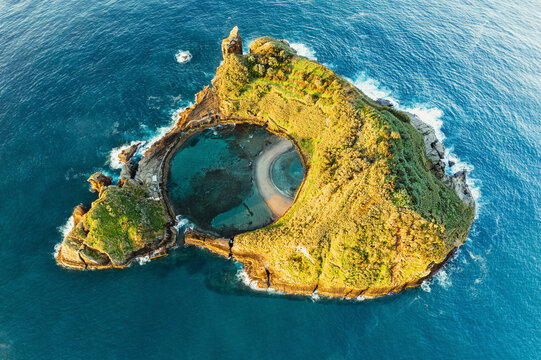Aerial view of the small, volcanic island Vila Franco do Compa at sunrise, Sao Miguel, Azores, Portugal.