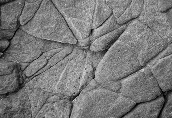 Eine Steintextur eines Felsen der einen vulkanischen Ursprung hat.
