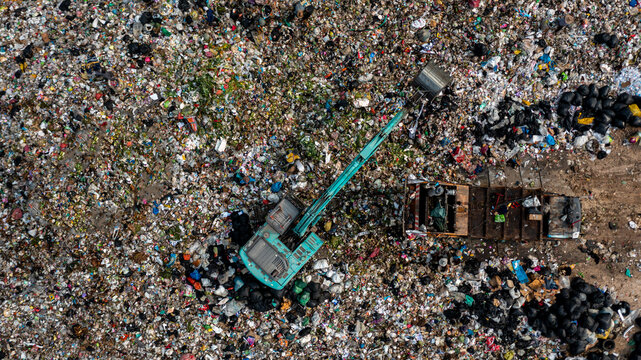 Aerial view waste dump, Waste from household in waste landfill disposal pile plastic garbage and various trash, Environmental pollution global warning.