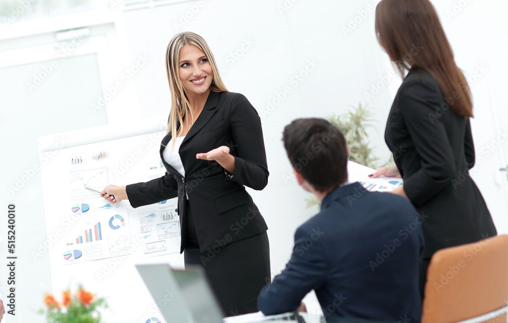 Poster business woman pointing a pointer on a flipchart