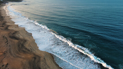 Beach Shore Aerial Drone Above ocean coastline tropical calm quiet meditative paradise  - obrazy, fototapety, plakaty