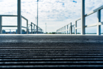 decking is laid on the pier. Defocus low view.