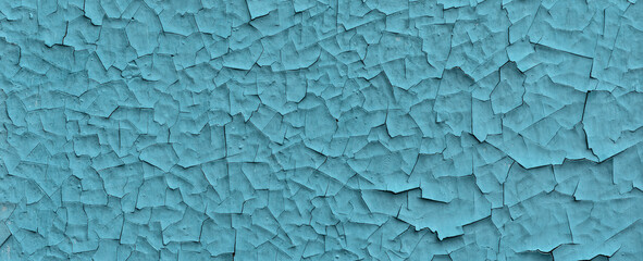 Cracked paint texture in turquoise color. Old painted surface wall. Banner