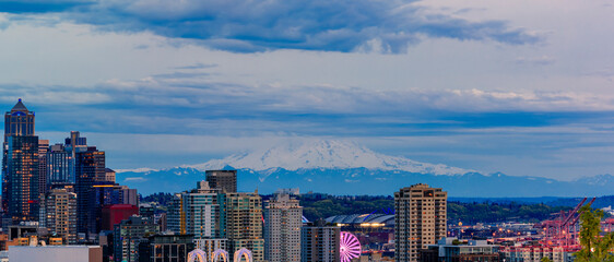City skyline panorama with Mount Rainier at sunset in Seattle, Washington