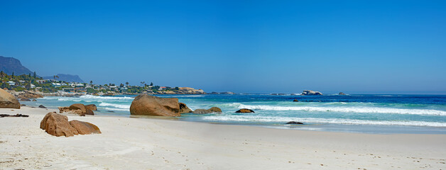Copyspace landscape and seascape view of a tropical beach in summer. Idyliic seaside tourist...