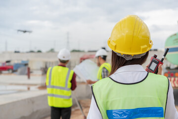Engineer working at construction site.