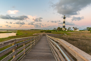 Bodie Island Lighthouse and Boardwalk Through a Marsh