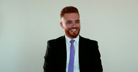 Happy executive raising fists in celebration, business manager celebrating success