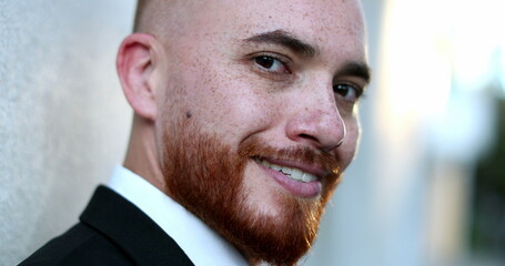 Handsome redhair man looking at camera smiling portrait