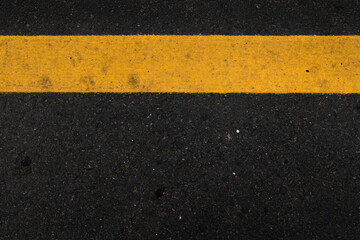 Fototapeta premium Asphalt texture background yellow line road surfaces